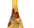 Carafe circa 1900 en verre ambre à décor