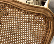 Méridienne à dossier canné, tissu écru. 