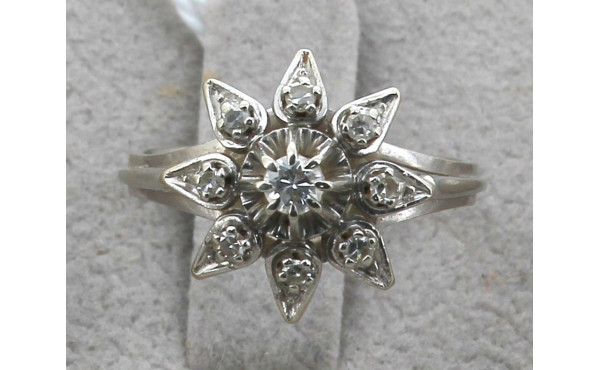Bague en or blanc sertie d'un diamant ce