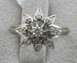 Bague en or blanc sertie d'un diamant ce