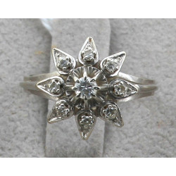 Bague en or blanc sertie d'un diamant ce