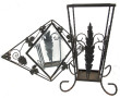 Miroir en fer forgé de forme losangique 
