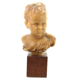 Buste d'enfant en cire, sur base en bois