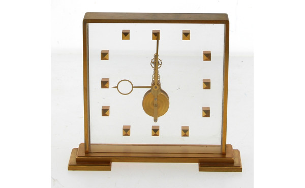 Pendule squelette en laiton brossé porta