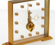 Pendule squelette en laiton brossé porta