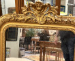 Miroir ancien de style rocaille, redoré,