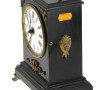 Petite pendule Napoléon III en bois noir