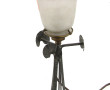 Lampe en fer forgé décor végétal années 