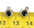 Paire de BO en or gris 18 carats, sertie