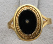 Bague en or jaune, poinçon tête d'aigle,