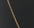 Chaîne en or jaune 18 cts, poinçon tête 