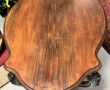 Table de milieu en bois sculpté à deux p