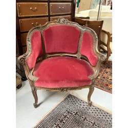 Bergère basse en bois naturel sculpté et