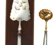 Pelle à tarte et petite cuillère saupoud
