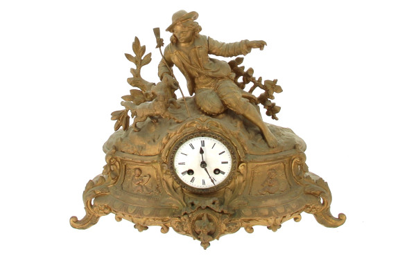 Pendule XIXe en métal doré, vendue en l'