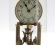 Pendule en laiton sous globe en verre, m