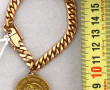 Bracelet or agrémenté d'une pièce de 20 