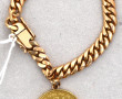 Bracelet or agrémenté d'une pièce de 20 