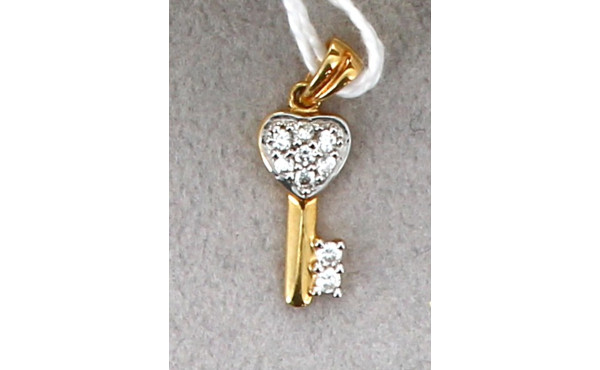 Pendentif "clé" en or et pierres blanche