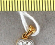 Pendentif "clé" en or et pierres blanche