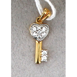 Pendentif "clé" en or et pierres blanche