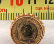 Bague en or avec pièce de 10 f or, montu