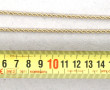 Collier en or jaune et or gris à maille 