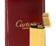 CARTIER - Briquet plaqué or en érin (un 