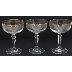 12 coupes à champagne en verre rehaussé 