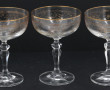 12 coupes à champagne en verre rehaussé 