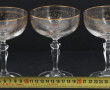 12 coupes à champagne en verre rehaussé 