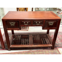 Bureau en bois verni ouvrant à 4 tiroir