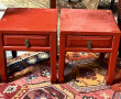 Paire de chevets chinois en laque rouge,