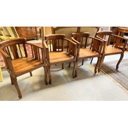 Quatre fauteuils en bois exotique à doss