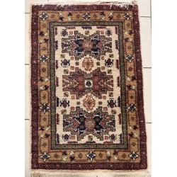 Petit tapis d'Orient en laine points nou