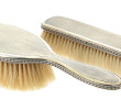 Deux brosses en argent à fond guilloché,