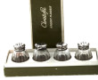 CHRISTOFLE - 4 salerons avec bouchons en