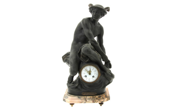 Pendule en régule et base marbre représe
