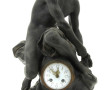 Pendule en régule et base marbre représe
