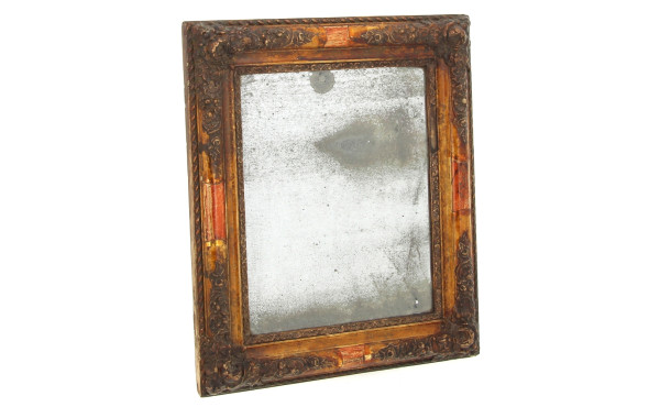 Petit miroir ancien à encadrement doré à