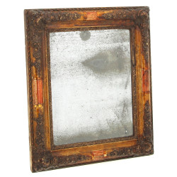 Petit miroir ancien à encadrement doré à