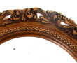 Miroir de forme ovale à décor de feuille