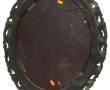 Miroir de forme ovale à décor de feuille