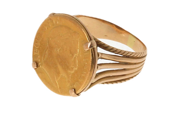 Bague en or montée avec une pièce de 10 