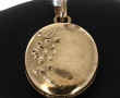 Pendentif ouvrant ancien en plaqué or dé
