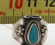 Bague en argent sertie d'un cabochon cou