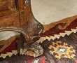 Commode tombeau en noyer sculpté et moul