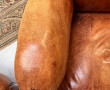 Deux fauteuils club anciens en cuir, ann