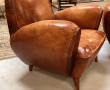 Deux fauteuils club anciens en cuir, ann