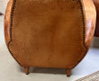 Deux fauteuils club anciens en cuir, ann